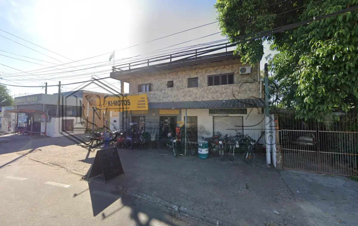 LOTE 013 - 50% do terreno correspondente a integralidade do prédio comercial e residencial